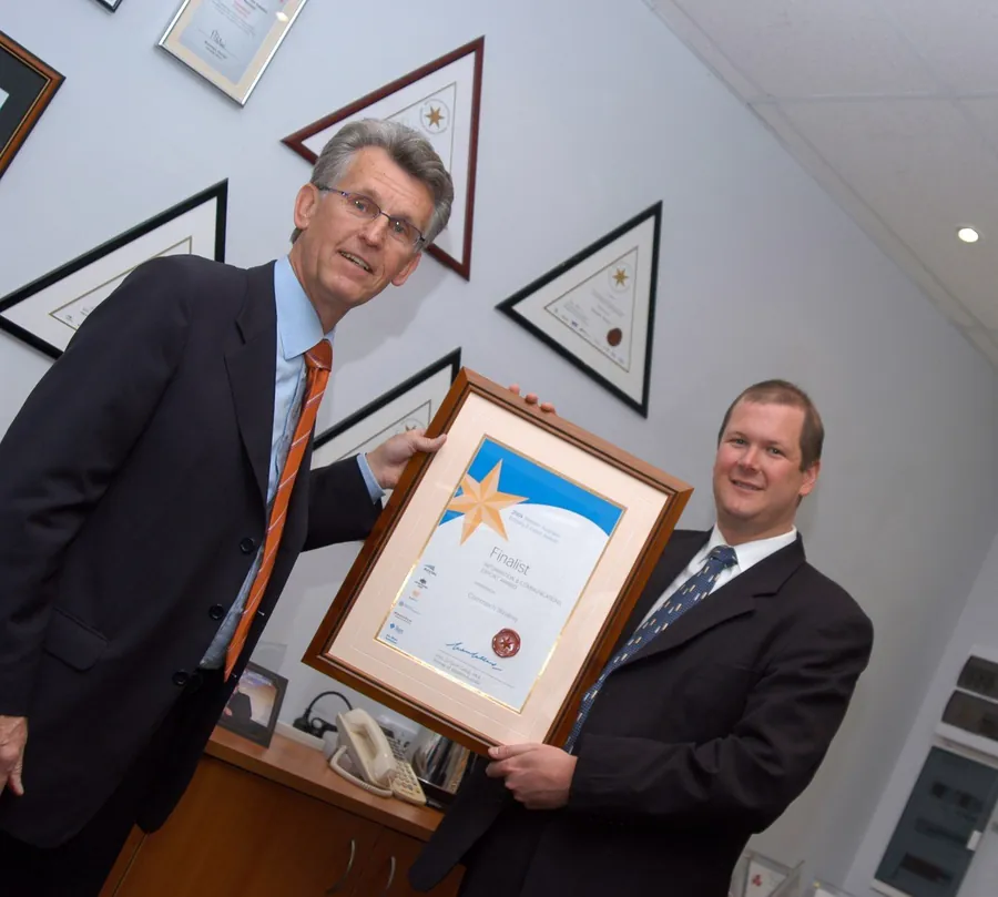 Nathan Buzza receiving the WA Information & Communications Export Award for CommtechWireless, mid-2000s.